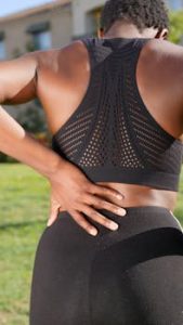 A Woman Having a Back Pain